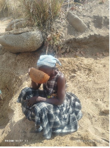 Another community member searching for water